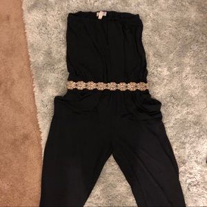 Michael Kora navy blue jump suit with jewel belt